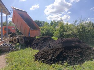 Доставка земли Камазом