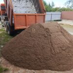 Доставка сыпучих строительных материалов